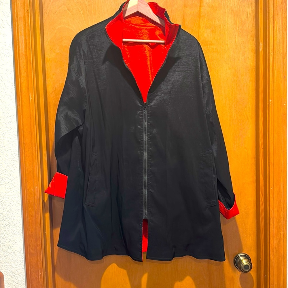 Black and Red Reversible Raincoat. Size L.